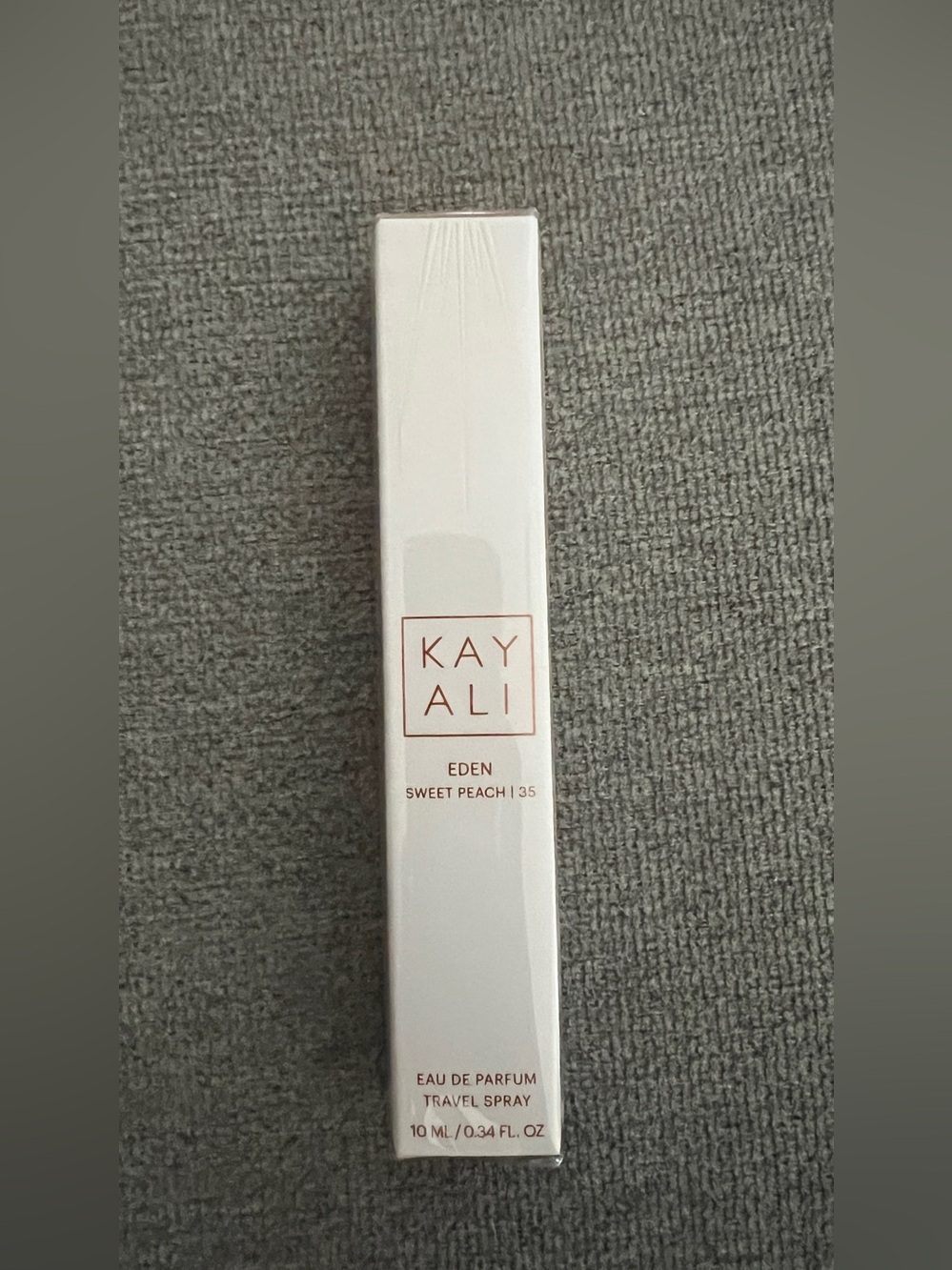 KAYALI
Mini EDEN SWEET PEACH | 35 Eau de Parfum Travel Spray - Picture 3 of 5